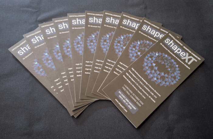 A stack of shapeXT flyers.